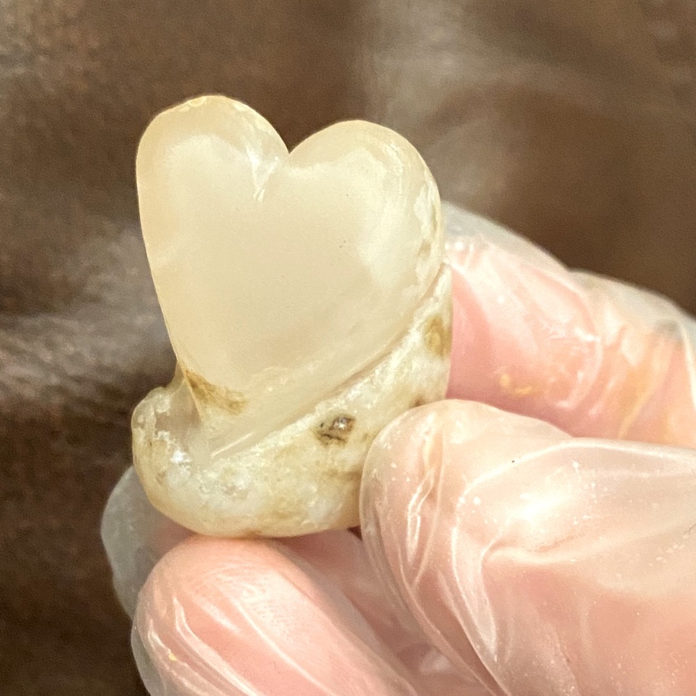 White aragonite heart shaped stone